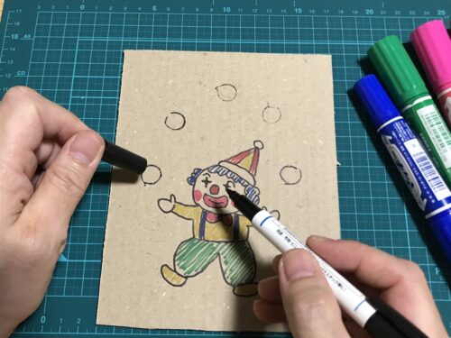 お手玉の円を描く